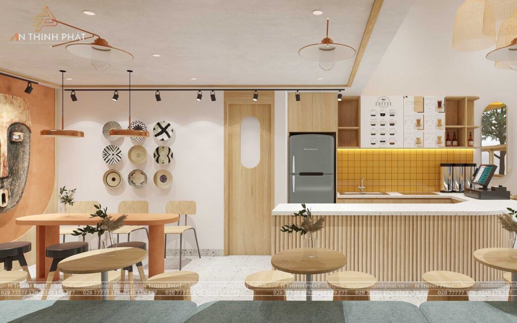 Thiết Kế Quán Cà Phê 15m2 Đẹp, Tối Ưu Chi Phí 4 Không gian quán cafe 15m2 thiết kế mở với cửa kính lớn, nội thất tối giản và cây xanh trang trí, tạo cảm giác rộng thoáng và thân thiện với thiên nhiên.